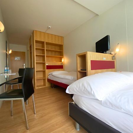 Hotel Seaside Spiez Exterior foto