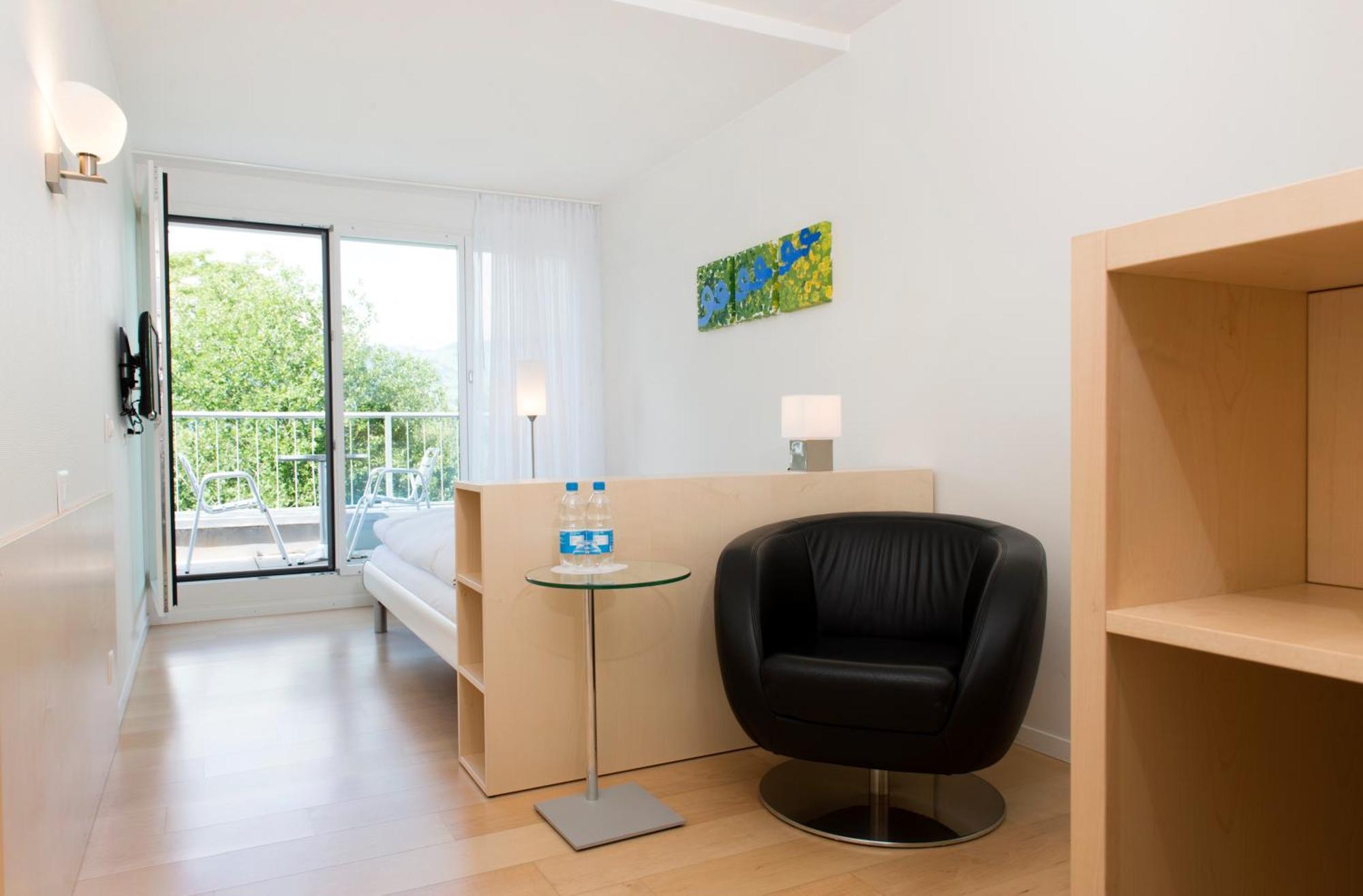 Hotel Seaside Spiez Habitación foto