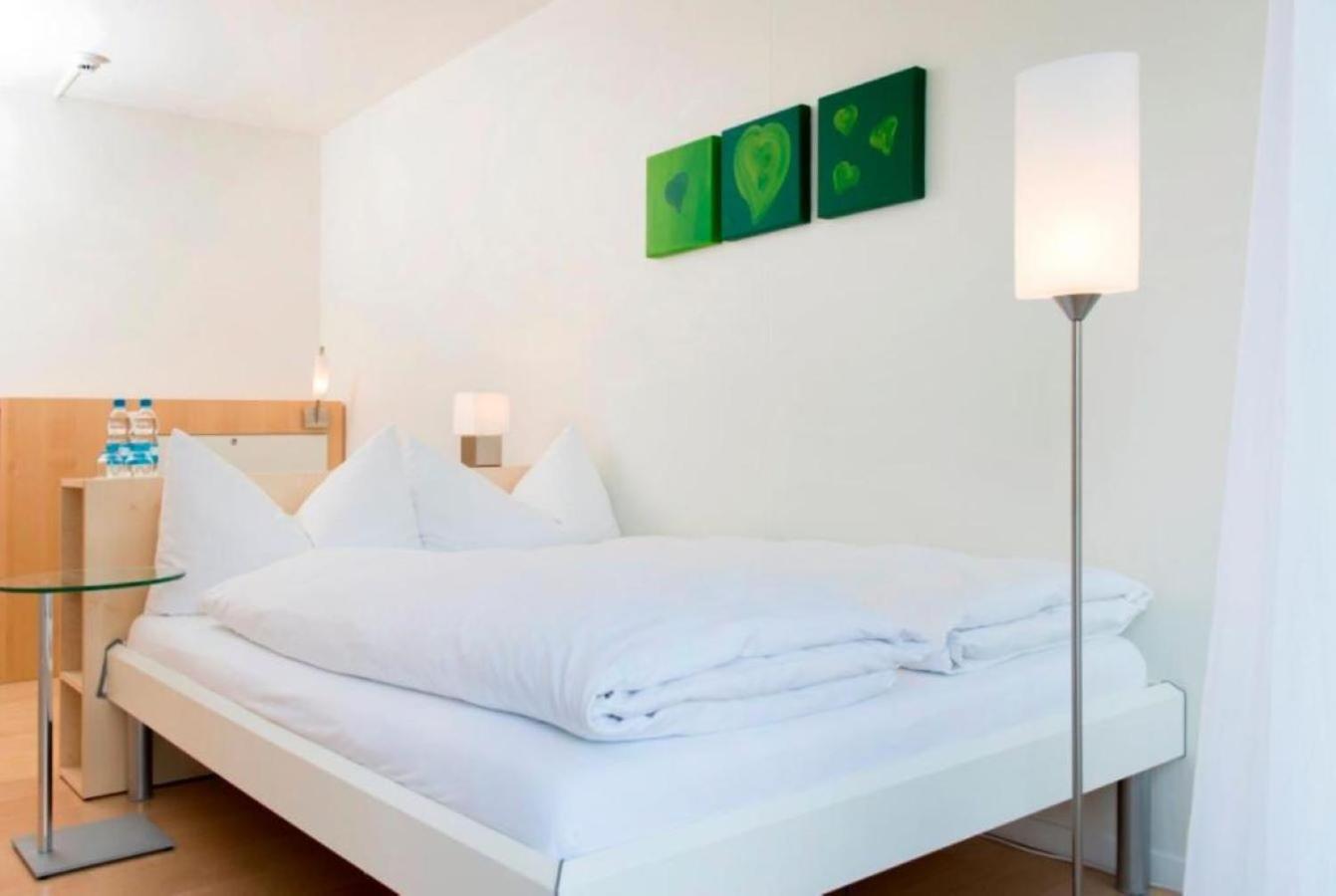 Hotel Seaside Spiez Habitación foto