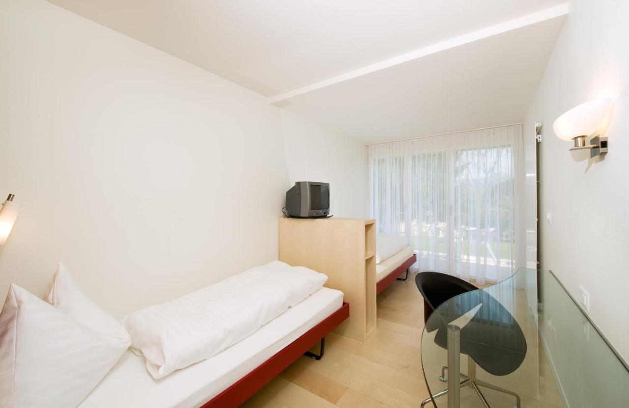 Hotel Seaside Spiez Exterior foto